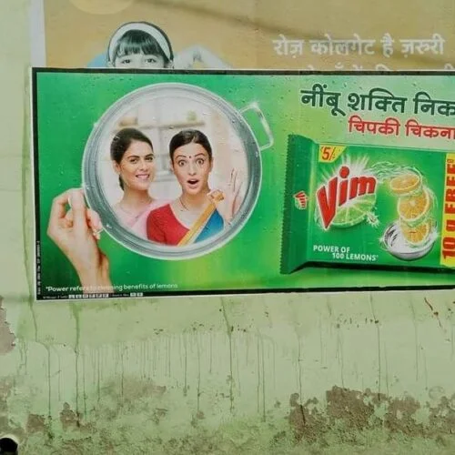 Digital wall painting by ACME Advertising Co. on an urban wall in India, featuring vibrant artwork, Hindi text, and bold visuals for outdoor brand promotion.