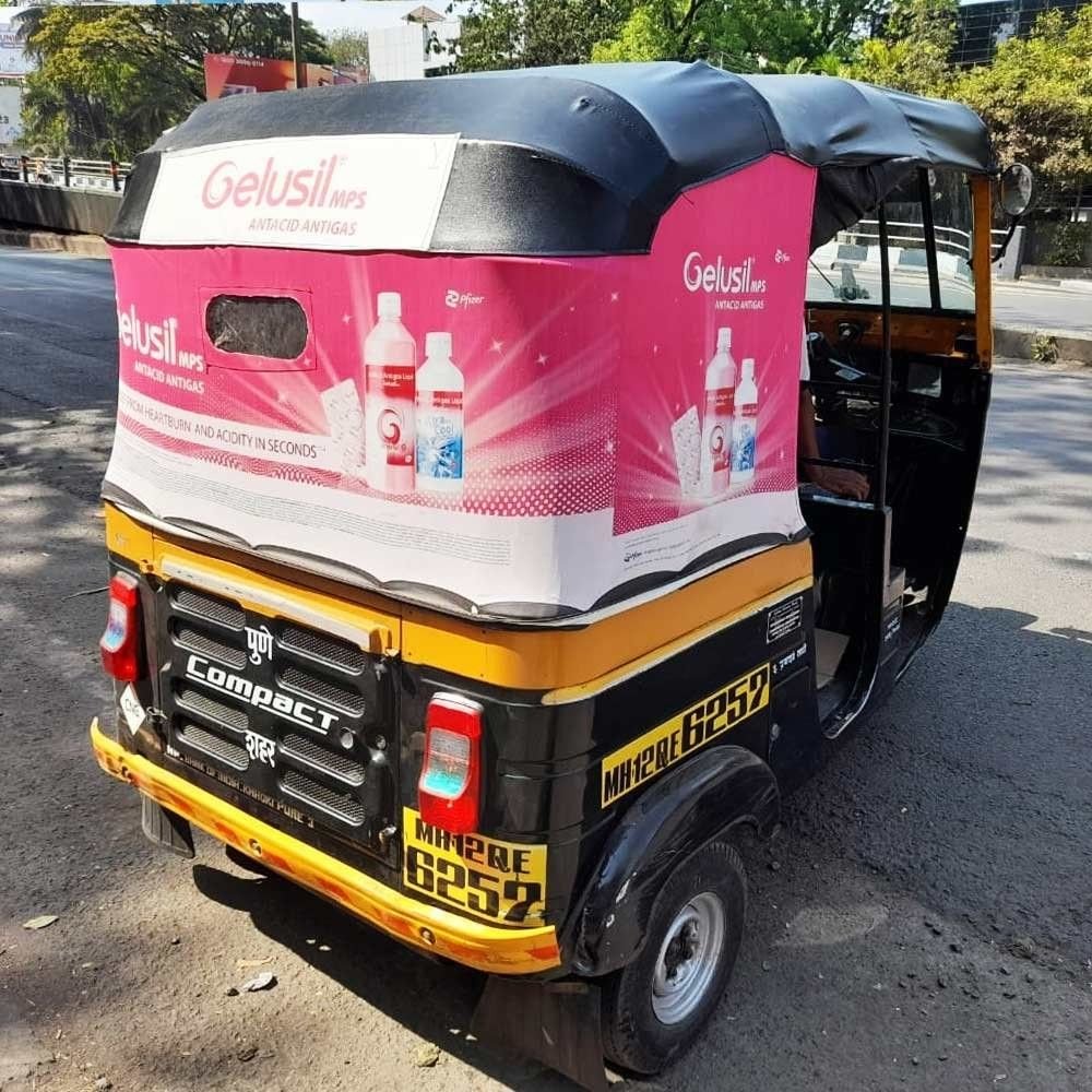 Auto Advertising Company showcasing vibrant vehicle branding and mobile marketing.