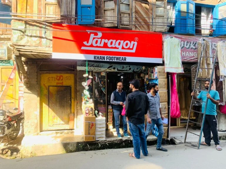 High-visibility Flex Boards installed by Acme Advertising Co. at a busy Delhi street corner, featuring bold brand graphics and weather-resistant vinyl material.