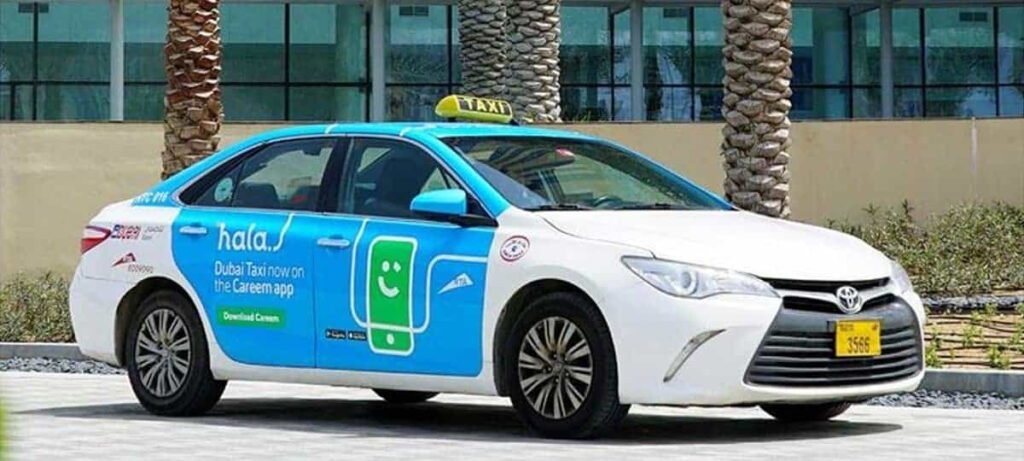 A white and blue taxi with a prominent advertisement for Careem, highlighting 'Dubai Taxi now on the Careem app' and encouraging users to download the app.